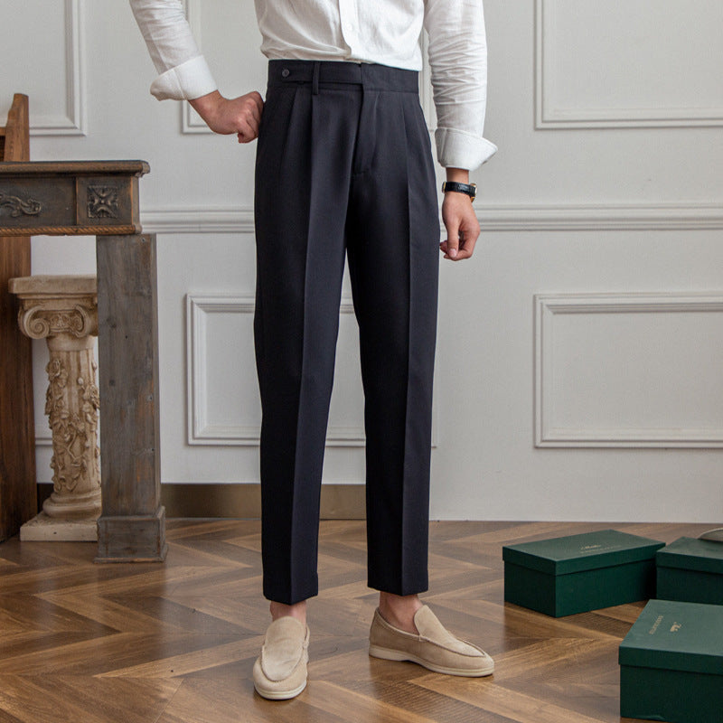 High-Waist Cropped Pleated Trousers, Button Tab – Men – Navy – worn, full length