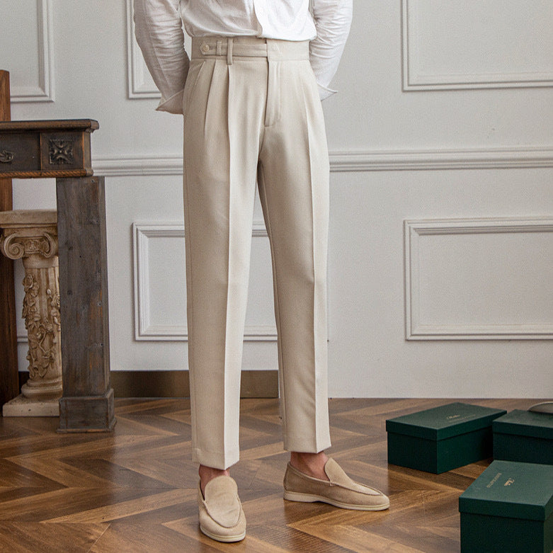 High-Waist Cropped Pleated Trousers, Button Tab – Men – Stone – worn, full length