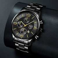 Stainless Steel Chronograph Watch – Men – Black · Black Dial · Gold Hands – lifestyle