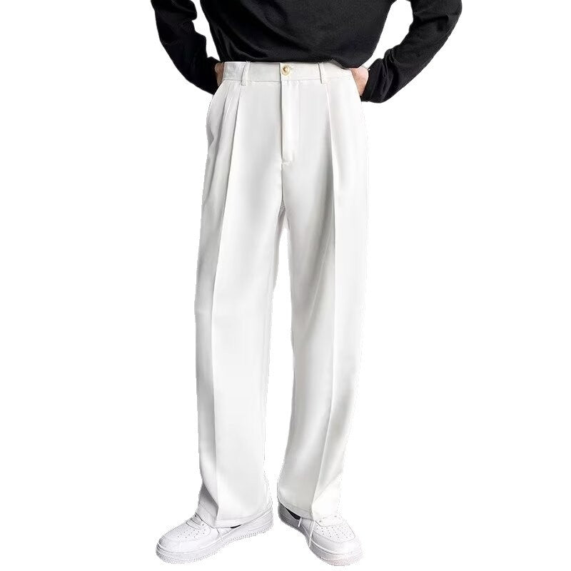 Wide-Leg Pleated Trousers, Fluid Drape – Men – White – worn, studio