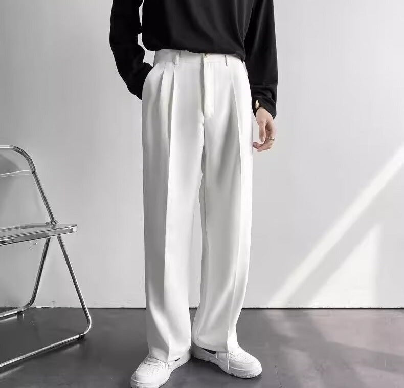 Wide-Leg Pleated Trousers, Fluid Drape – Men – White – worn, front