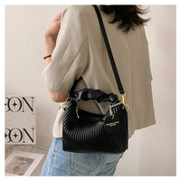 Pleated Faux-Leather Shoulder Bag – Women – Black – worn, crossbody
